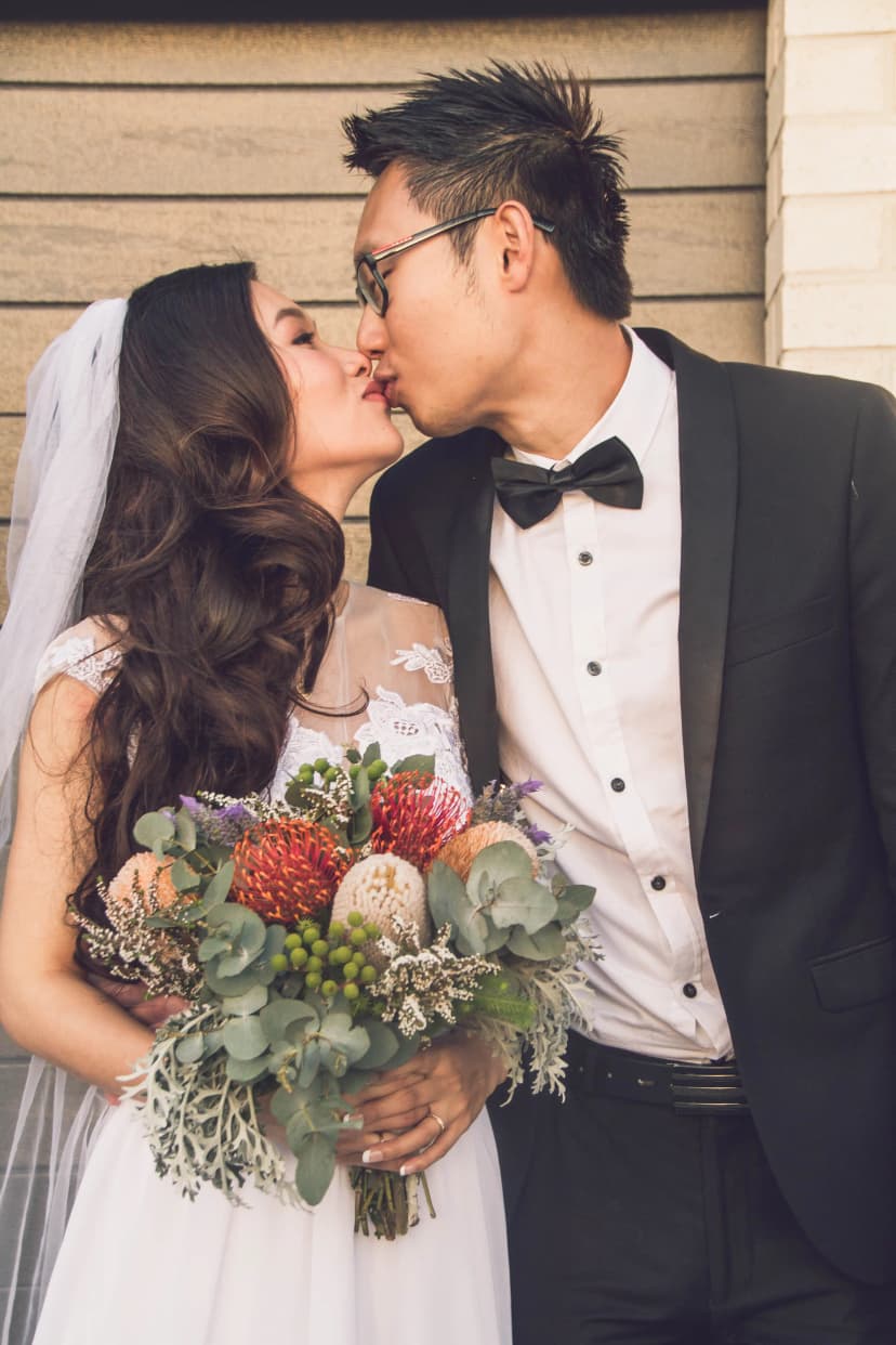 Lovely couple kissing on their day, Le Artist